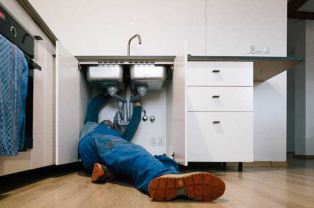 Professional Drain Cleaning technician working in Pelham, NH